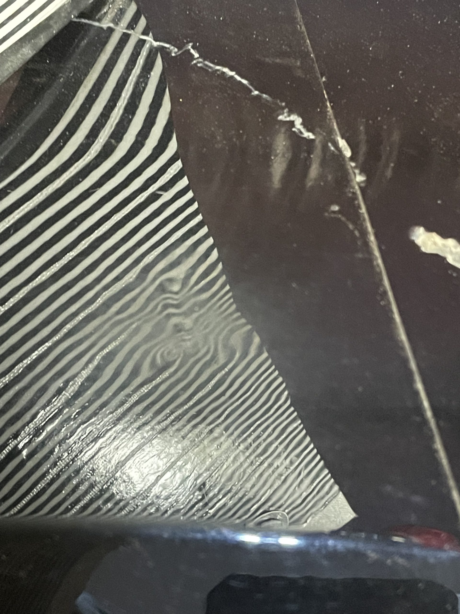 Minor autobody repair in progress on an aluminum Ford fender